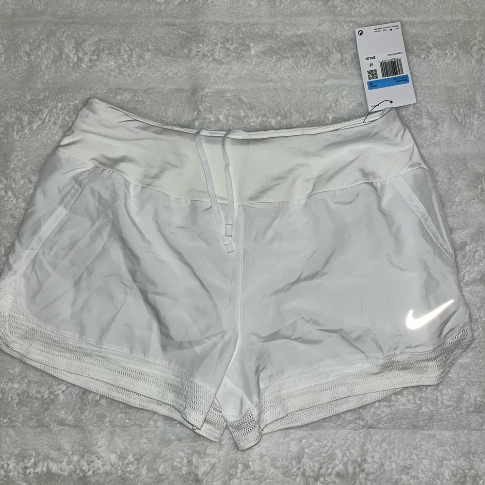 NWT (M) women's Nike running shorts